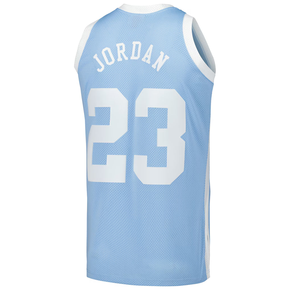 MITCHELL AND NESS NCAA BLUE NORTH CAROLINA TAR HEELS 1983 MICHAEL JORDAN JERSEY by Mitchell and Ness