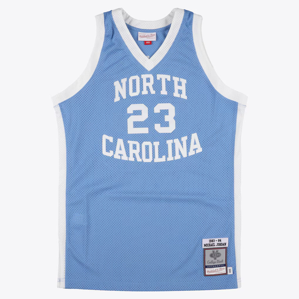 MITCHELL AND NESS NCAA BLUE NORTH CAROLINA TAR HEELS 1983 MICHAEL JORDAN JERSEY by Mitchell and Ness