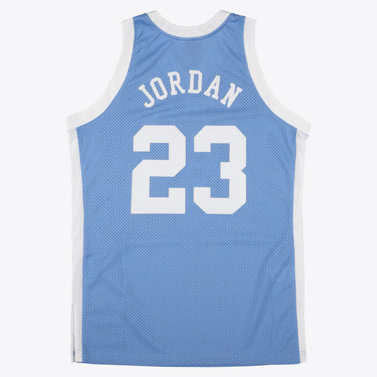 MITCHELL AND NESS NCAA BLUE NORTH CAROLINA TAR HEELS 1983 MICHAEL JORDAN JERSEY by Mitchell and Ness