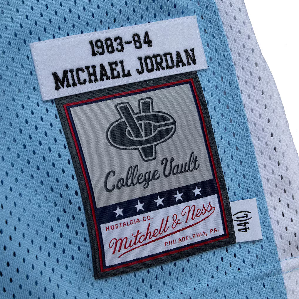 MITCHELL AND NESS NCAA BLUE NORTH CAROLINA TAR HEELS 1983 MICHAEL JORDAN JERSEY by Mitchell and Ness