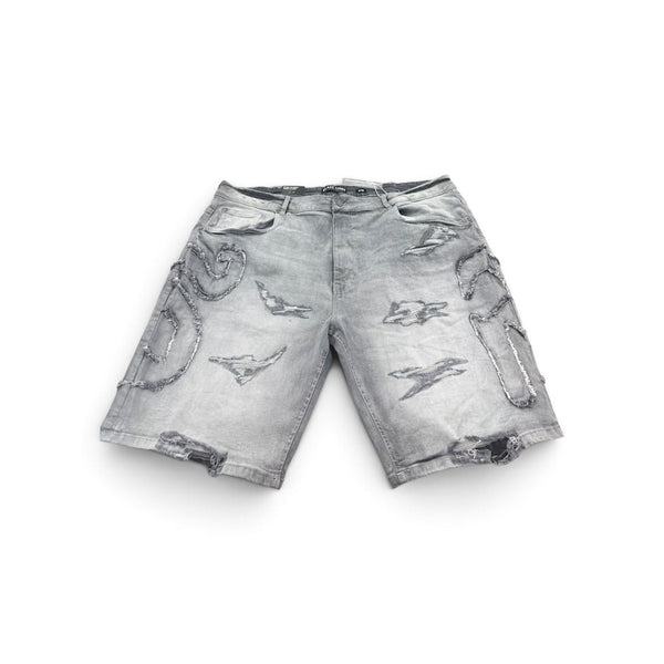 BLACK LIGHT RIPPED PATCH JORTS by Black Light