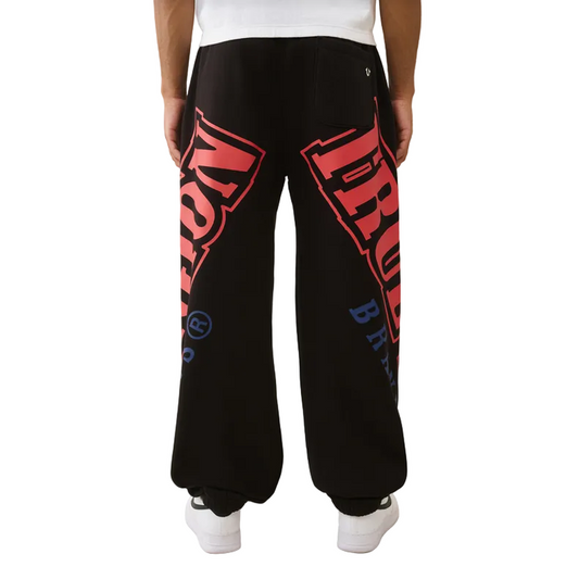 TRUE RELIGION OVERT ARCH LOGO BAGGY SWEATS by True Religion