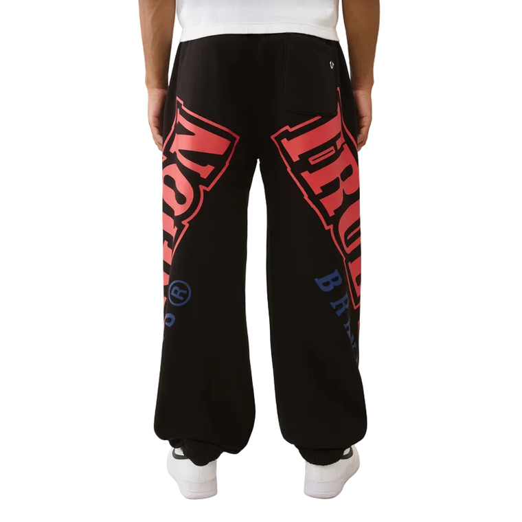 TRUE RELIGION OVERT ARCH LOGO BAGGY SWEATS by True Religion