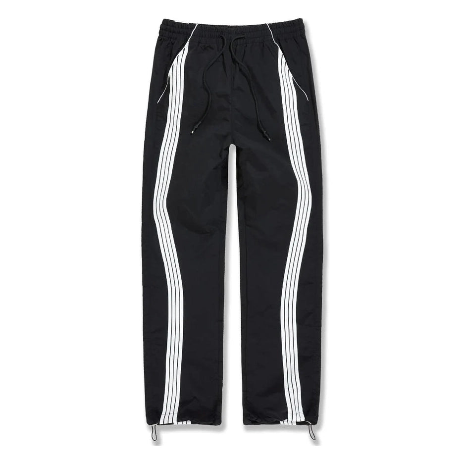 Black Big Mens The Beautiful Game track pants with white side stripes, elastic waist, drawstring, and water-resistant polyester fabric.